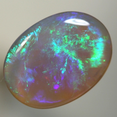 SOLID CRYSTAL OPAL Rolling flashes of green to purple